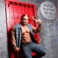 Bill Baker shows his muscles - Picture 2