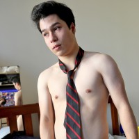 Ryan Kai strips and shows off his cock - Picture 12