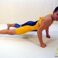 Marty poses in wrestling singlet - Picture 15