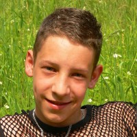 Boy gets undressed outdoor - Picture 1