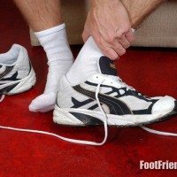 Tibor shows off his socks - Picture 16