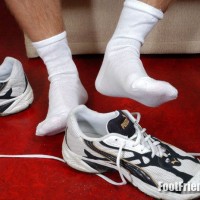 Tibor shows off his socks - Picture 19