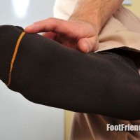 Eric shows off his socks - Picture 16