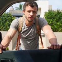 Nate gets in a car - Picture 1