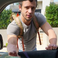 Nate gets in a car - Picture 2