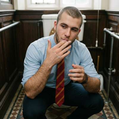 Just finished deep-throating in the academy’s bathroom—face glistening with his cum. Licking every drop clean, savoring the...