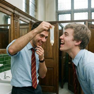 Step into the steam of an elite academy’s bathroom, where two boys tease each other with a used condom, their laughter...