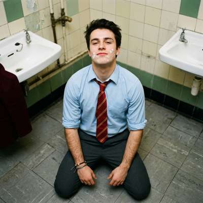 In the hallowed halls of the academy, where marble floors gleam and ambition burns bright, one boy kneels in devotion. His...