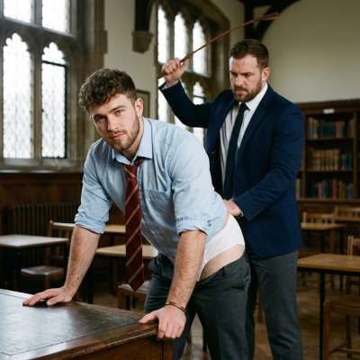 The professor’s cane lands with a sharp crack—justice served in tailored trousers. Every stripe a reminder: discipline never...