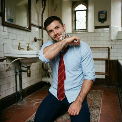 A gentleman of refined grace, freshly cleansed—where even the smallest rituals speak volumes of poise in halls where...