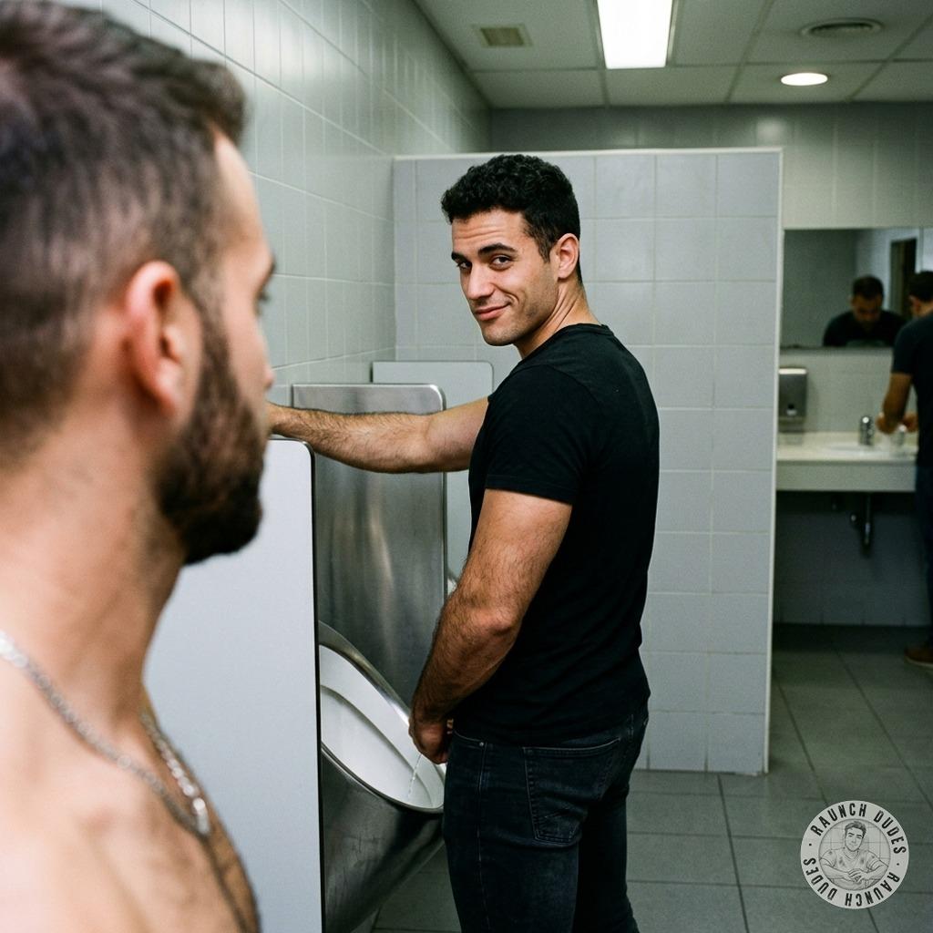 Two dudes in the john, one’s got that filthy urge to piss all over the other’s tight ass. The way his cock throbs while he...