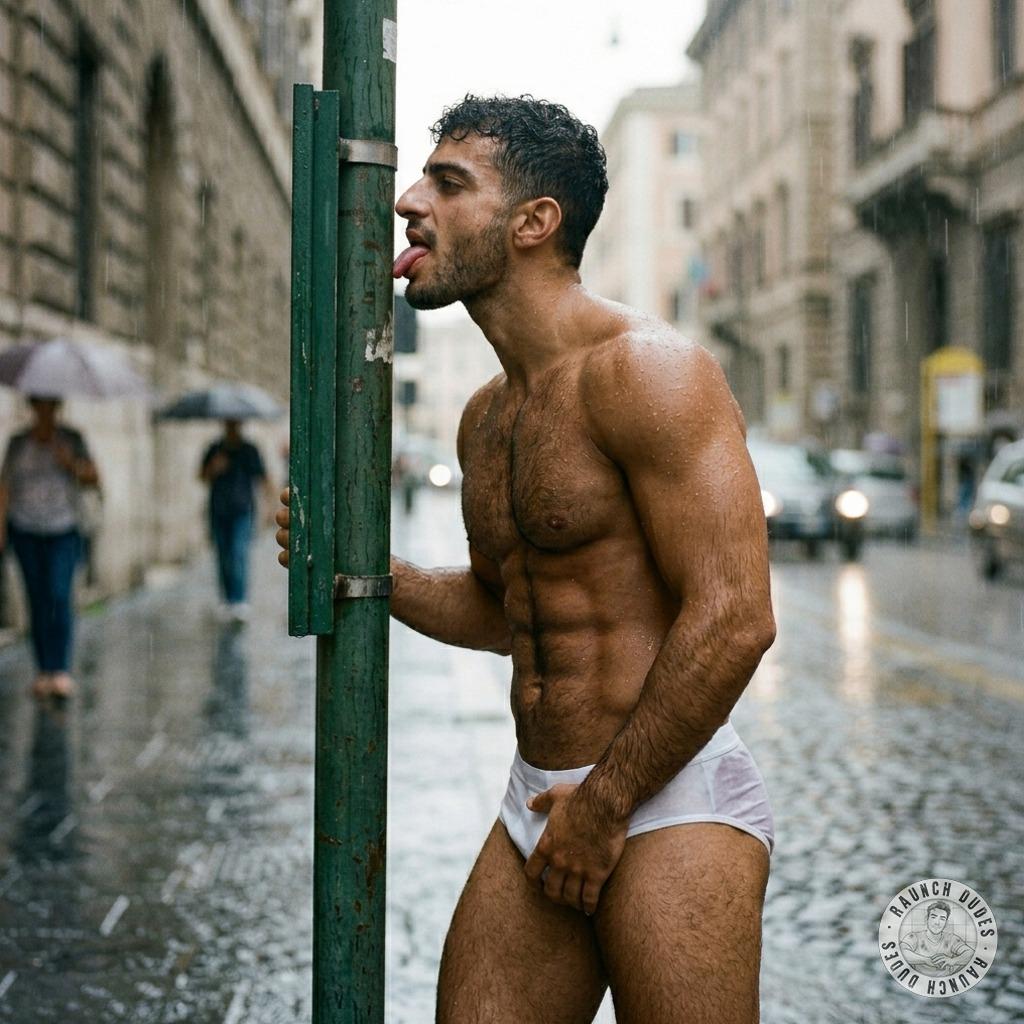 That hungry little slut can’t get enough of that bus pole—licking it like it’s the cock he craves, slobbering all over it...