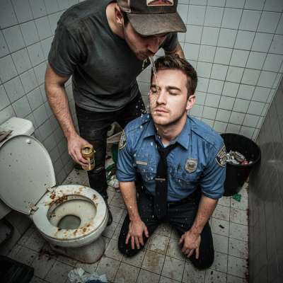 Nothing hotter than a cop on his knees, letting a street thug spit all over his face. Power play at its finest!...