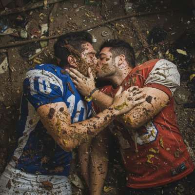 Two football players making out on a filthy public bathroom floor, covered in shit and puke—nothing hotter than raw, messy...