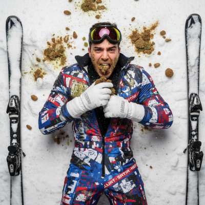 Snow angel or shit angel? This skier’s got a taste for the wild side—covered in vomit, snow, and a fresh scoop of his own...