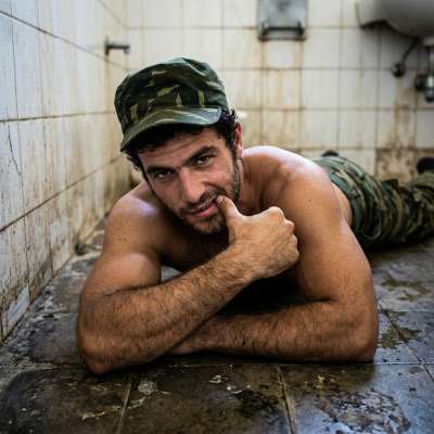 Military bear face-down in a shit-smeared floor, ass clenching tight around my cock while I fuck him raw. His sweaty body...
