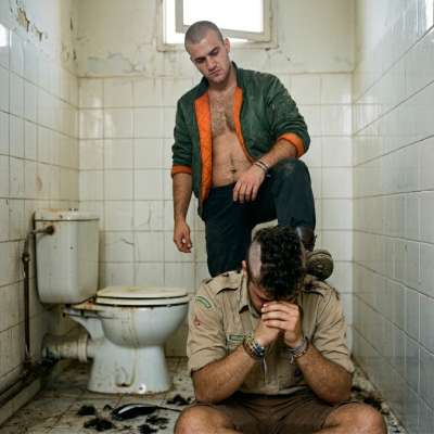 Watch that skinhead shave that scout bald in the shitter, forcing him to kneel in the piss and cum stains while his scalp...