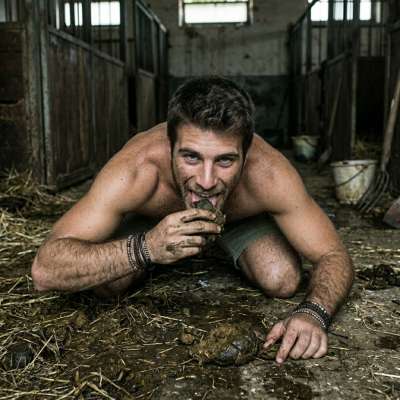 That hungry little twink is on his knees in the barn, face deep in a pile of warm, musky shit, slurping it up like it’s the...