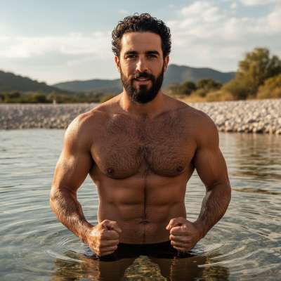 Rippling muscles glisten under the sun as he dives into the crystal waves. Pure Mediterranean magic captured in one shot....