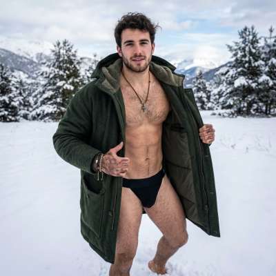 Frozen in time, a vision of raw masculinity. This jockstrap-clad god owns the snow with effortless cool. 🔥❄️ #snow #nature...