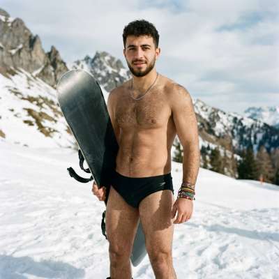 Chasing thrills in just the essentials—where adventure meets raw, sun-kissed beauty. Nature’s finest model, shredding snow...
