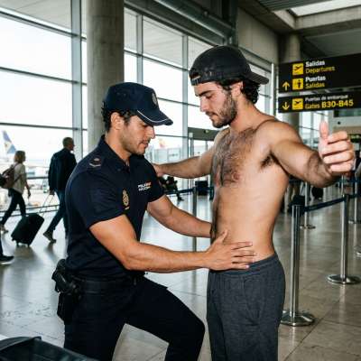 Hot cop alert! Nothing beats the confidence of a man in uniform, even when he’s just doing his job. 😏✈️ #malebeauty #airport...