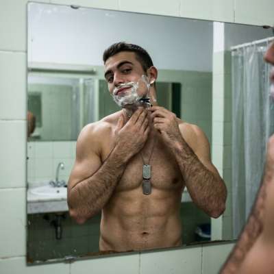 Every morning, he sharpens his discipline—and his jawline. The perfect blend of strength and style. #bath