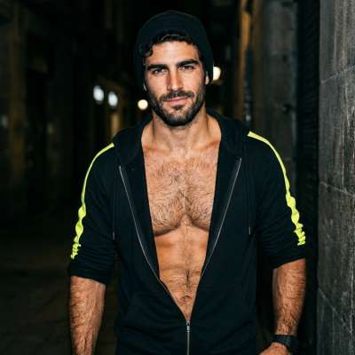 Every inch of him is pure art. That open hoodie? A masterpiece. Celebrate the beauty of men who own their confidence....