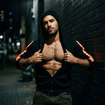 Every time he opens his jacket, the world pauses. Pure magnetism in motion. #malebeauty #street #hairy #athlete