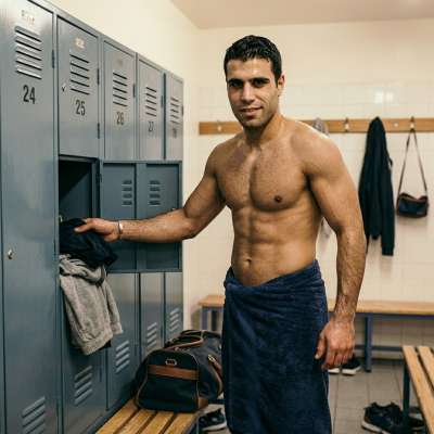 Every muscle, every move—raw power meets unshakable confidence. The perfect blend of strength and style. #lockerroom...
