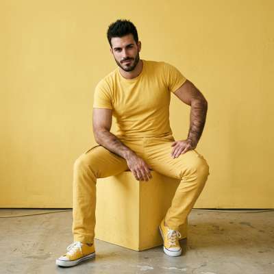 Golden vibes only! This stunning guy in yellow is serving pure sunshine. Who else loves a pop of color? 🌞💛 #studio