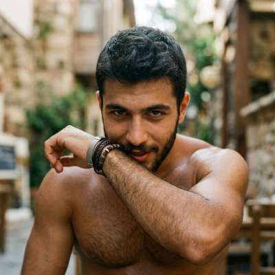 Every swipe of that arm, every smoldering glance—pure art. The way he cleans his mouth says more than words ever could....