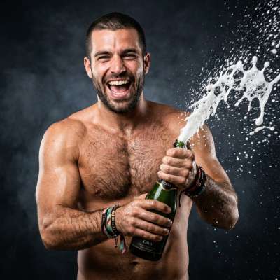 Sparkling champagne, a confident smile, and a body made for sin. Celebrate the art of masculine beauty in every pour....