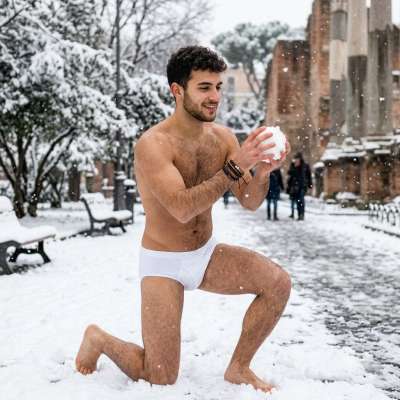 Frosty fun in just skivvies—nothing beats a snowball fight with that icy charm. #snow #underwear #street