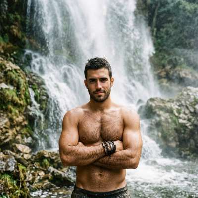 Confidence meets nature’s raw beauty—where strength and serenity collide. 💦 #malebeauty #nature #athlete