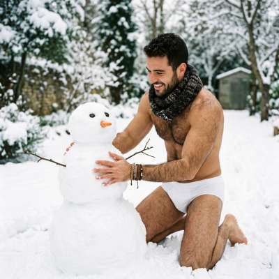 Winter magic meets raw charm—nothing quite like a man crafting beauty in the snow. Pure, effortless allure. #malebeauty...